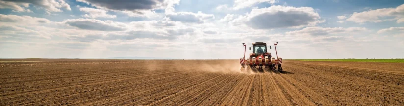 Tractor working a field — Agritach agricultural supplies